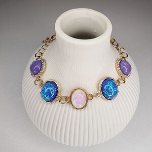 ​Dazzling Blue Fire Opal Link Bracelet w/ Purple Accent Rhinestones